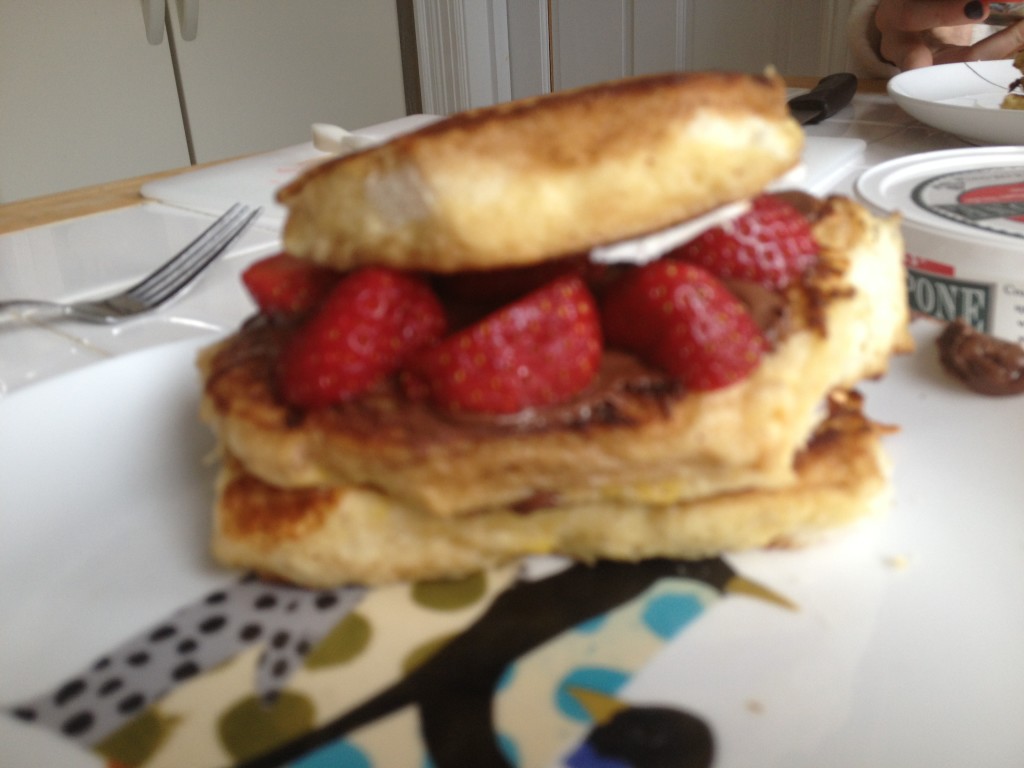 Layer the toast with nutella, strawberries and marscapone cheese and no syrup needed! Enjoy.
